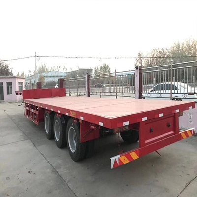 Βαρύ φορτίο 3 άξονες Low Bed Lowboy Flatbed Semi Trailer φορτηγό με υδραυλικό ανελκυστήρα και γουσόνακ