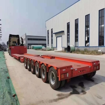 Βαρύ φορτίο 3 άξονες Low Bed Lowboy Flatbed Semi Trailer φορτηγό με υδραυλικό ανελκυστήρα και γουσόνακ