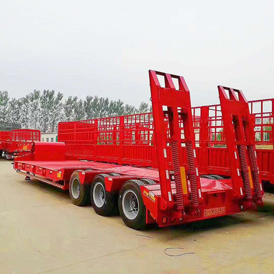 Βαρύ φορτίο 3 άξονες Low Bed Lowboy Flatbed Semi Trailer φορτηγό με υδραυλικό ανελκυστήρα και γουσόνακ